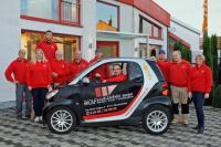 Team mit Auto